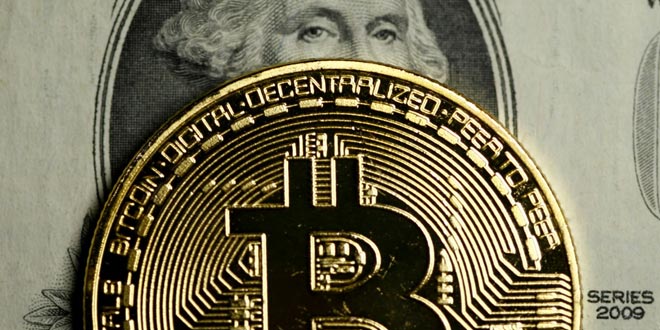 Bitcoin potrebbe raggiungere 15.000 dollari entro fine luglio secondo John McAfee